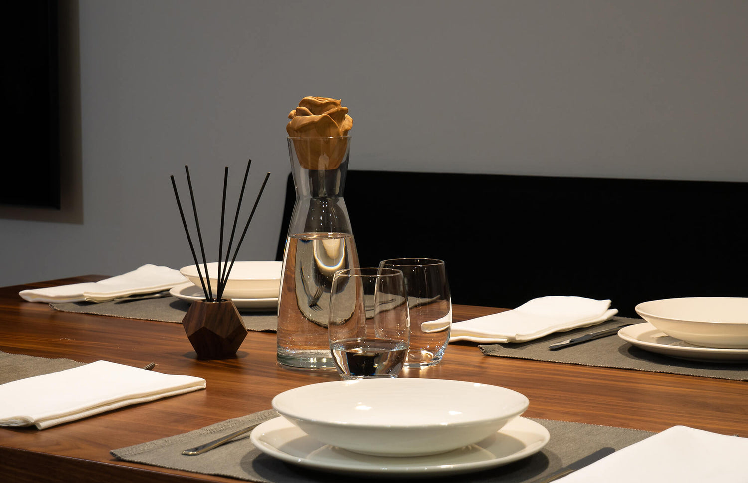 Dinner-Table with water-carafe and scent dispenser